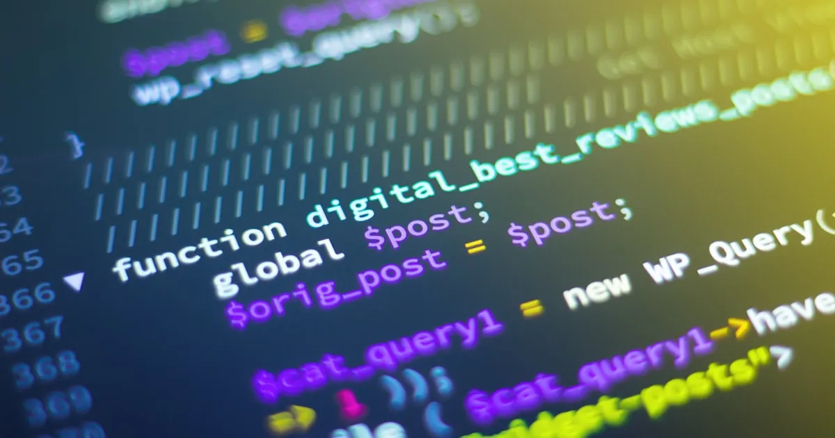 Developer reviewing AI-generated code on a monitor with a code review interface